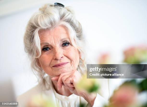 April 2019, Berlin: EXCLUSIVE - Helga Piur, actress, sits in her dining room. Photo: Britta Pedersen/dpa-Zentralbild/ZB