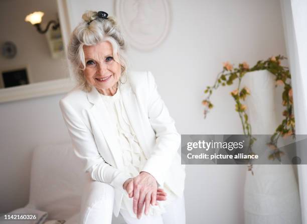 April 2019, Berlin: EXCLUSIVE - Helga Piur, actress, in her dining room. Photo: Britta Pedersen/dpa-Zentralbild/ZB