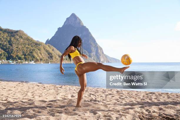 Swimsuit Issue 2019: Soccer player Crystal Dunn poses for the 2019 Sports Illustrated swimsuit issue on March 14, 2019 in Saint Lucia. PUBLISHED...