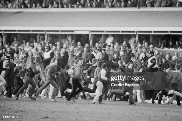 Pitch invasion during Birmingham City v West Ham United match at St Andrew's Stadium, Birmingham, UK, 18th February 1984.