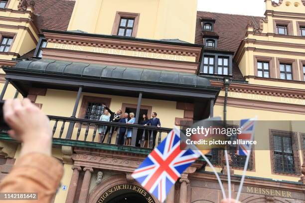 May 2019, Saxony, Leipzig: The British heir to the throne Prince Charles and his wife Camilla stand with Burkhard Jung , mayor of Leipzig and his...