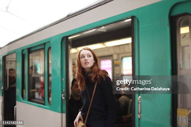 portrait of a young woman in the subway in paris - tunnelbana bildbanksfoton och bilder