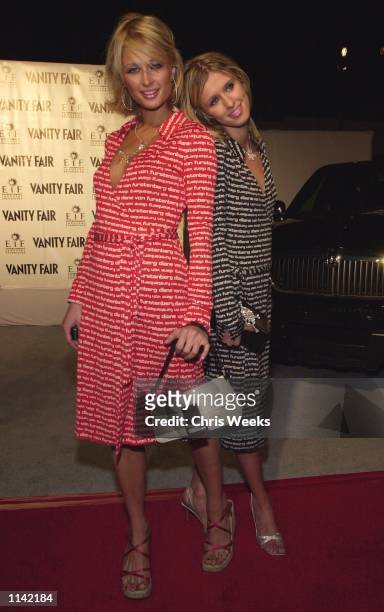 Model sisters Paris Hilton and Nicky Hilton arrive at a pre-Oscar party hosted by Vanity Fair magazine and the Entertainment Industry Foundation...