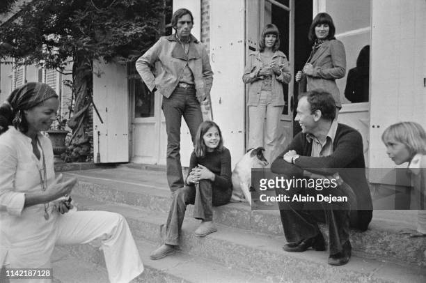 Austrian-born German actress Romy Schneider with her son David , French actor Jean-Louis Trintignant with his daughter Marie Trintignant on the set...