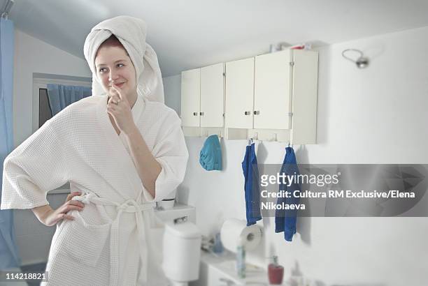 young woman in bathroom - latvia girls stock pictures, royalty-free photos & images