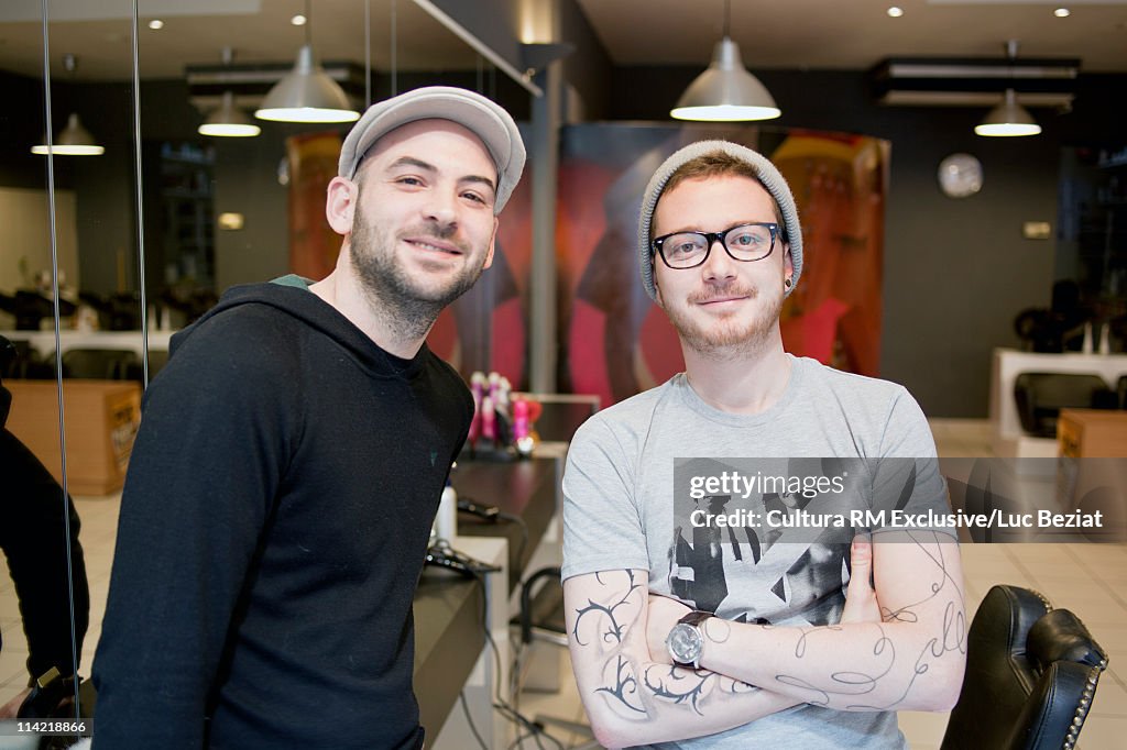 2 young hairdressers in their salon