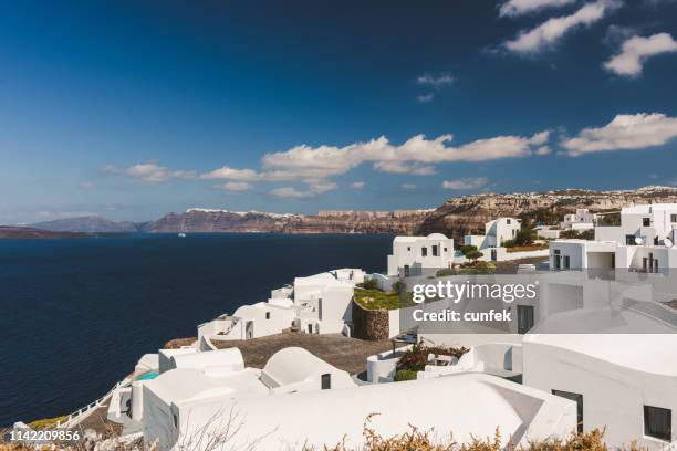 traditional white roof village, greece - mediterranean-blue-roof-santorini stock pictures, royalty-free photos & images