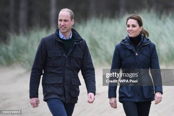 Prince William, Duke of Cambridge and Catherine, Duchess of Cambridge on a visit to Newborough Beach where they met the Menai Bridge Scouts and...