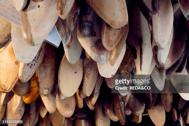 Wooden models prepared by hands before the realization of the shoes inside the workshop of the artisan Gabriele Gmeiner. Campiello del Sol. San Polo....