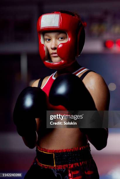 portrait of teenage athletic boxing girl - head protector stock pictures, royalty-free photos & images