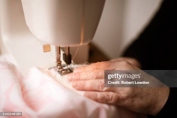 sewing clothes - cucitura foto e immagini stock