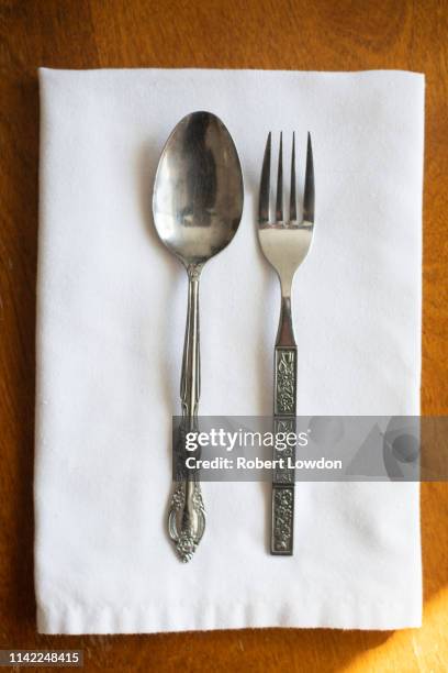 fork and spoon - napkin stock pictures, royalty-free photos & images