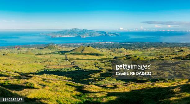 Landscape with craters. Faial island and town Horta in the background. Pico Island. An island in the Azores in the Atlantic ocean. The Azores are an...