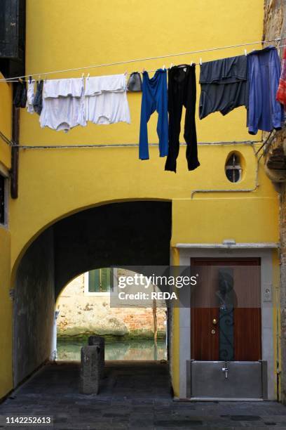 Yellow house in Venice. Veneto. Italy. Europe.