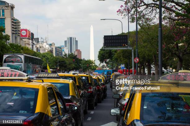 Taxi drivers gather in Av. 9 de Julio during a protest against UBER service on April 12, 2019 in Buenos Aires, Argentina.