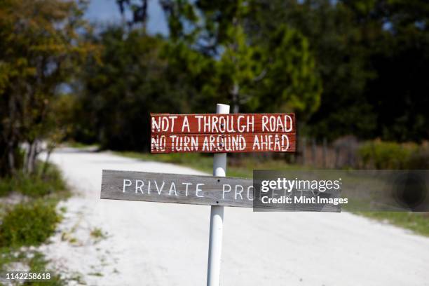 warning side on a road - private property stock pictures, royalty-free photos & images