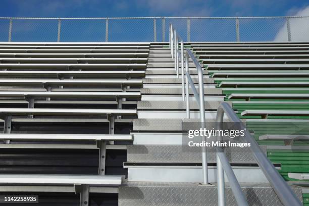 bleachers at a sports field - bleachers stock pictures, royalty-free photos & images