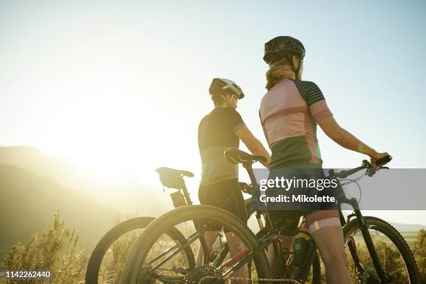 living out their bike-it list - bicycle stock pictures, royalty-free photos & images