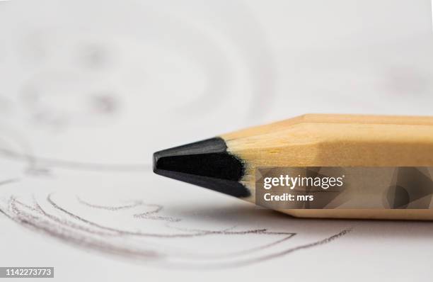 close-up of pencil by drawing on paper - pencil drawing stock pictures, royalty-free photos & images