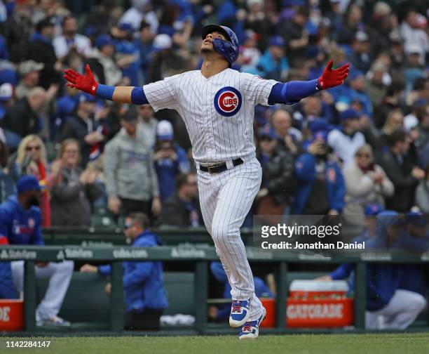 Willson Contreras of the Chicago Cubs celebrates hitting a home run in the 1st inning as he runs the bases against the Los Angeles Angels at Wrigley...