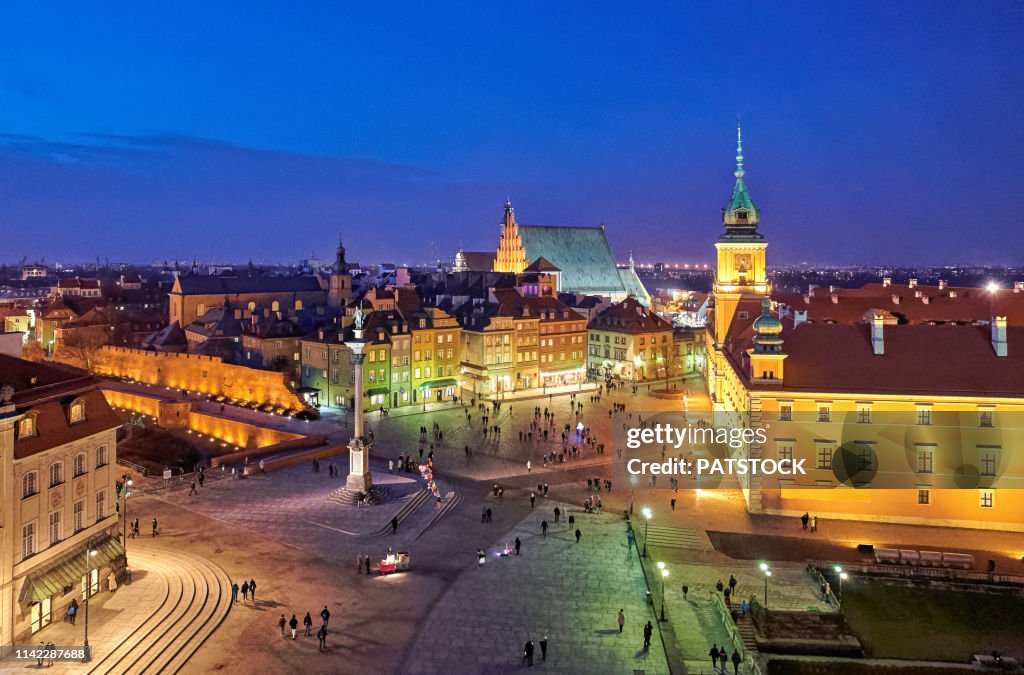 Royal Castle and Sigismund's Column located in Castle Square in Warsaw old town at night