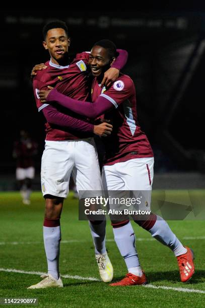 Jacob Ramsey of Aston Villa celebrates with teammate Colin Odutayo after scoring his team's first goal during the Premier League 2 match between...