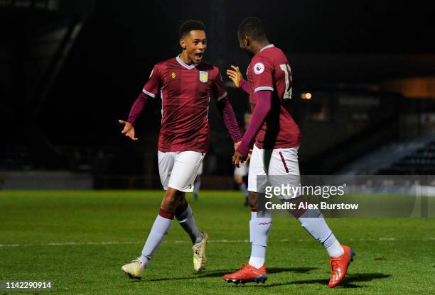 Jacob Ramsey of Aston Villa celebrates with teammate Colin Odutayo after scoring his team's first goal during the Premier League 2 match between...