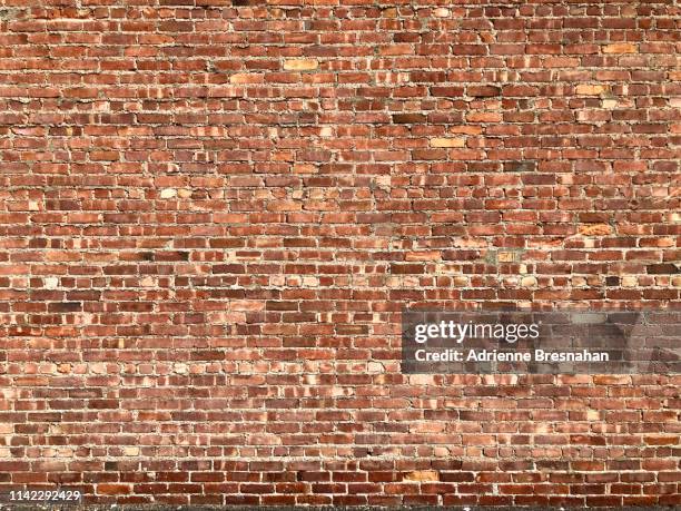 red brick wall - rustic wall stock pictures, royalty-free photos & images