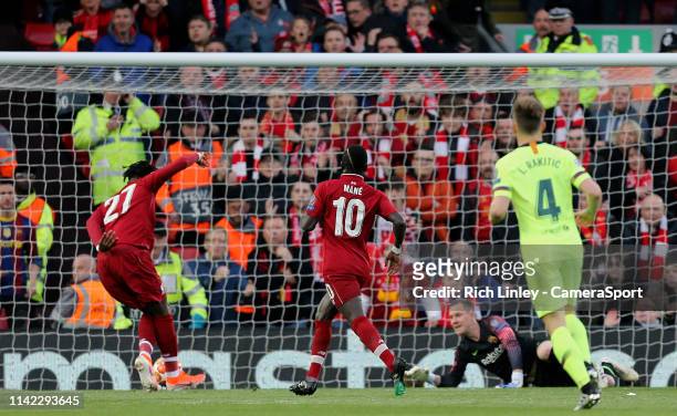 Liverpool's Divock Origi scores the opening goal during the UEFA Champions League Semi Final second leg match between Liverpool and Barcelona at...