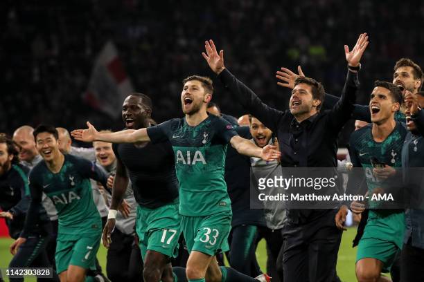Mauricio Pochettino head coach / manager of Tottenham Hotspur celebrates with his players and coaching staff at full time during the UEFA Champions...