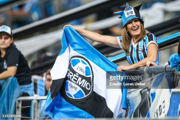 Gremio fan enjoys the atmosphere before the match between Gremio and Universidad Catolica, as part of Copa Conmebol Libertadores 2019, at Arena do...