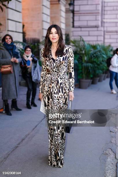Monica Bellucci is seen outside the "Diner du Cinema - Madame Figaro" event, on April 12, 2019 in Paris, France.