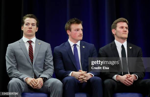 Finalists Jimmy Schuldt of St. Cloud State,Cale Makar of the University of Massachusetts and Adam Fox of Harvard University await the announcement of...