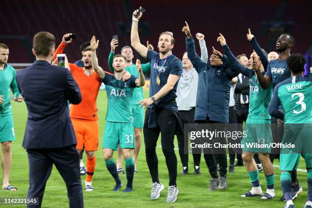 Harry Kane of Tottenham celebrates with the team during the UEFA Champions League Semi Final second leg match between Ajax and Tottenham Hotspur at...