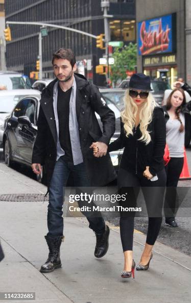 Singer Christina Aguilera and boyfriend Matthew Rutler seen arriving ...