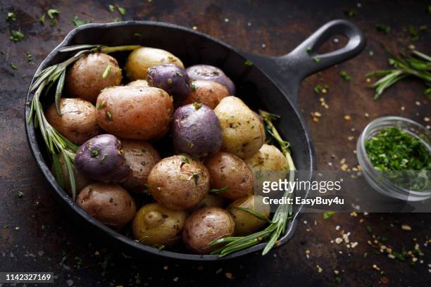 cooked small potatoes - raw new potato stock pictures, royalty-free photos & images
