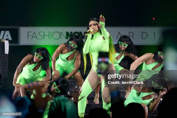 Cardi B performs onstage as Fashion Nova Presents: Party With Cardi at Hollywood Palladium on May 9, 2019 in Los Angeles, California.
