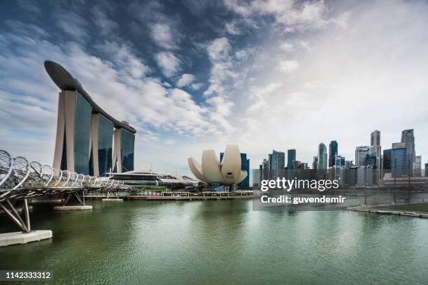 the skyline of singapore - singapore city day stock pictures, royalty-free photos & images