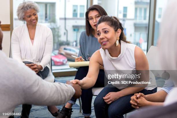 young businesswoman meets new client - vulnerability stock pictures, royalty-free photos & images