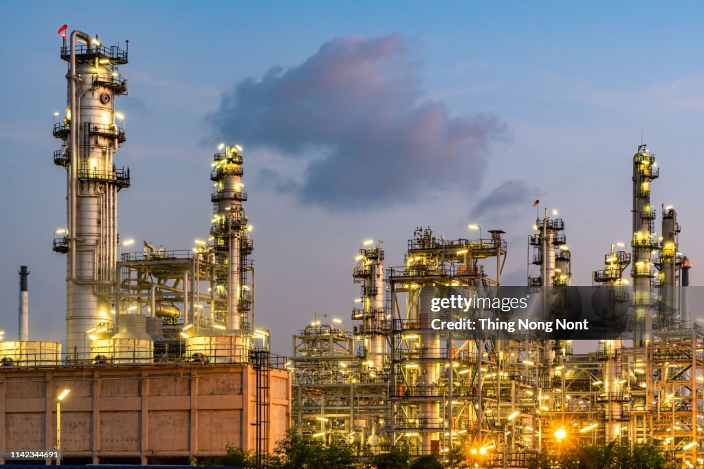 Oil refinery power station at sunset