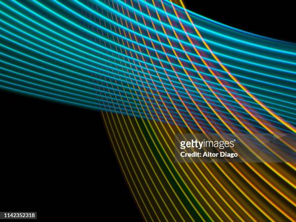futuristic blue curved and golden lines interlaced. virtual environment. 3d. - neon numbers stock-fotos und bilder