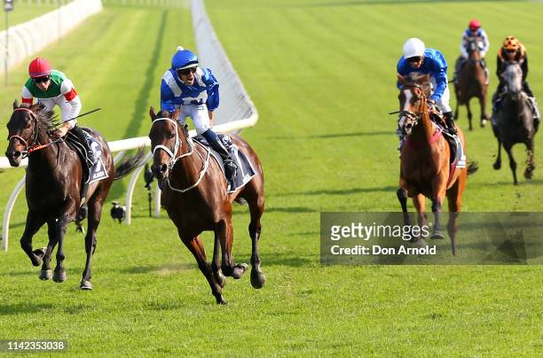 Hugh Bowman, riding champion racehorse Winx, gestures to the crowd after riding her final race to victory in the Queen Elizabeth Stakes at The...
