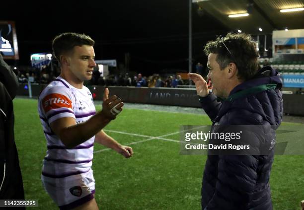 George Ford of Leicester Tigers celebrates with his father Mike Ford, the Leicester Tigers coaching consultant, after their victory during the...