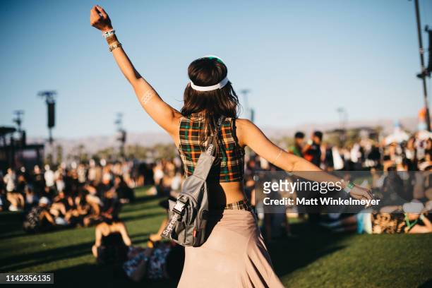 Festivalgoer street style at The 2019 Coachella Valley Music And Arts Festival - Weekend 1 on April 12, 2019 in Indio, California.