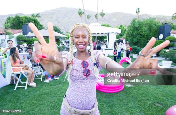 Tolula Adeyami poses for portrait at beGlammed Sunset Soiree Presented by Fullscreen on April 12, 2019 in Palm Springs, California.