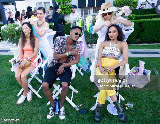 Guests receiving hair extensions at beGlammed Sunset Soiree Presented by Fullscreen on April 12, 2019 in Palm Springs, California.