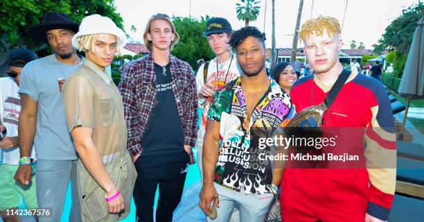 Joel Mignott and Shaun Ross pose for portrait with guests at beGlammed Sunset Soiree Presented by Fullscreen on April 12, 2019 in Palm Springs,...