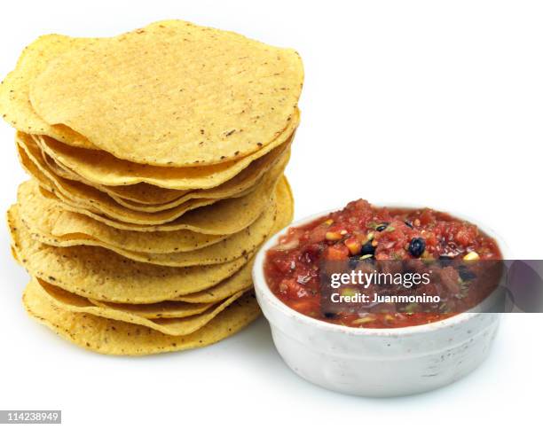 stack of tortilla chips and mexican salsa - tostada stock pictures, royalty-free photos & images