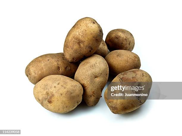 plain potatoes - yukon gold stock pictures, royalty-free photos & images