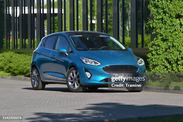 ford fiesta on the street - ford fiesta cars stock pictures, royalty-free photos & images